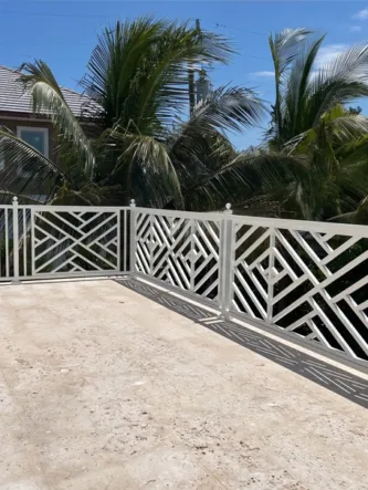 White metal railing on a coastal home